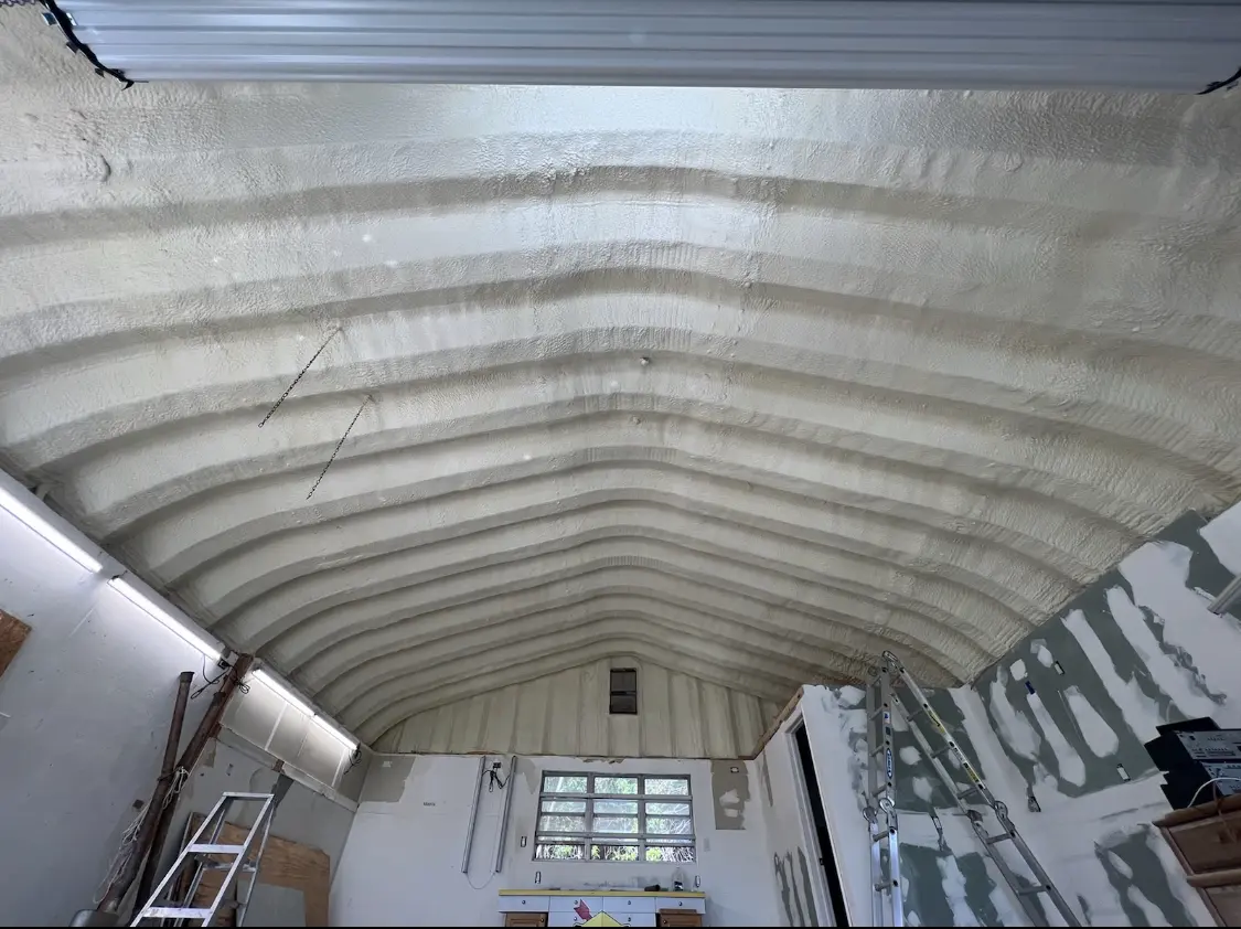 Spray polyurethane foam applied to the underside of a metal roof deck in Royal Kunia